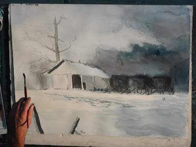 Tom painting barn and buggies in snow