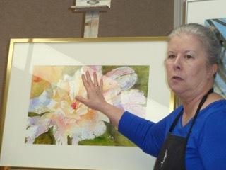 Deb explains the technique used in one of her paintings (Poured Yupo Peony) featured in the book AcrylicWorks 2